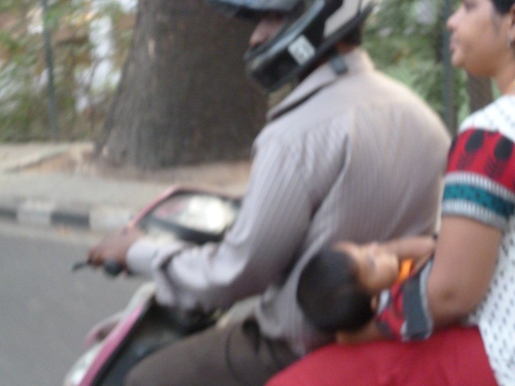 did I mention that entire families would ride a scooter at once?